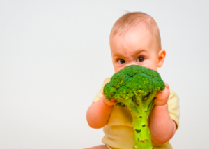 baby with broccoli
